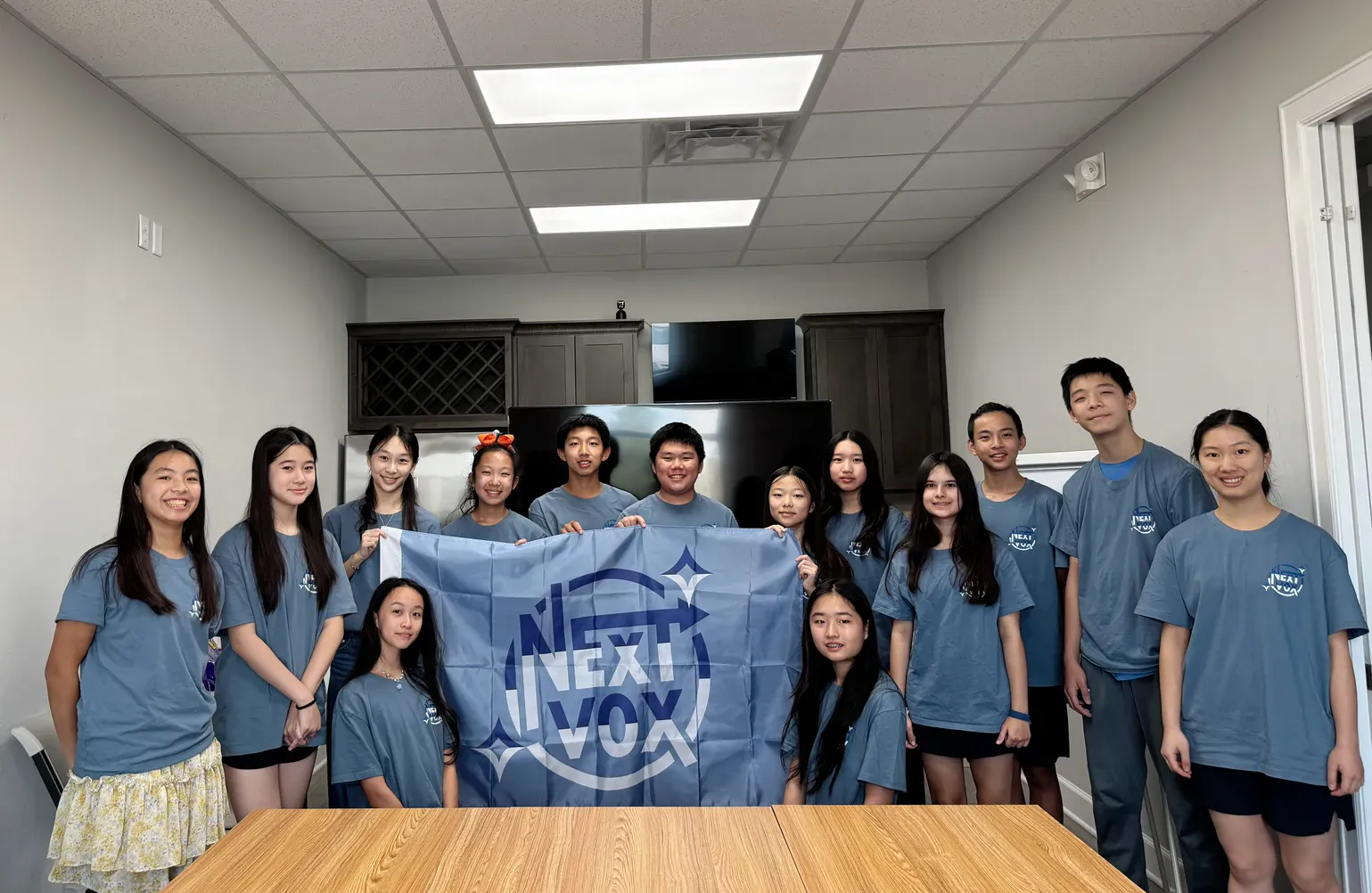 The NextVox team gathered together